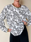 Blusa Yves Saint Laurent in tessuto jacquard bianco e nero fantasia Domino