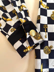 Camicia in raso di seta a scacchi con fiocco al collo “Escada”