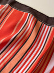Foulard Byron in pura seta fantasia a righe trasversali declinata in nuance calde