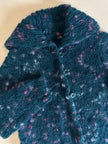 Cardigan in lana bouclé verde bottiglia con lavorazione bottonata multicolor