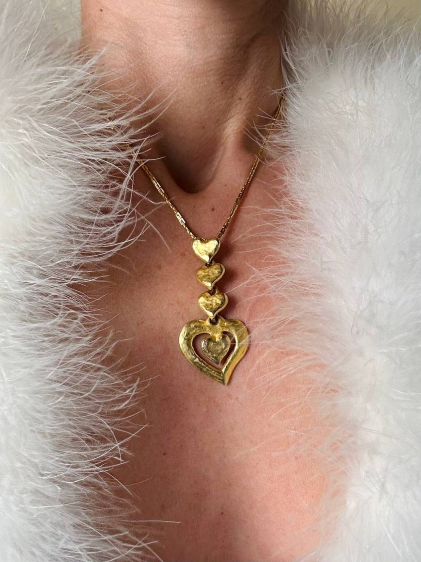 Collana dorata con ciondolo pendente a cuoricini “Yves Saint Laurent”