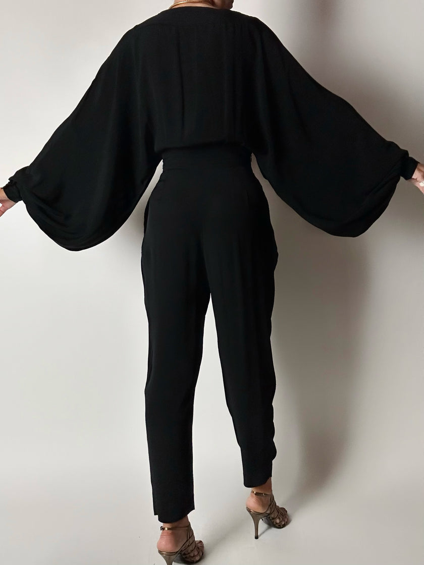 Jumpsuit vintage Emilio Pucci nera con maniche a pipistrello e nappa couture
