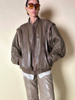 Bomber con maniche rimovibili in pelle color fango “Arpell”