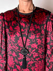 Vintage-Halskette aus schwarzer Spiralkordel mit Schmuckanhänger und Couture-Quaste