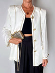 Giacca vintage Yves Saint Laurent bianco latte con serpentine dorate e bottoni gioiello