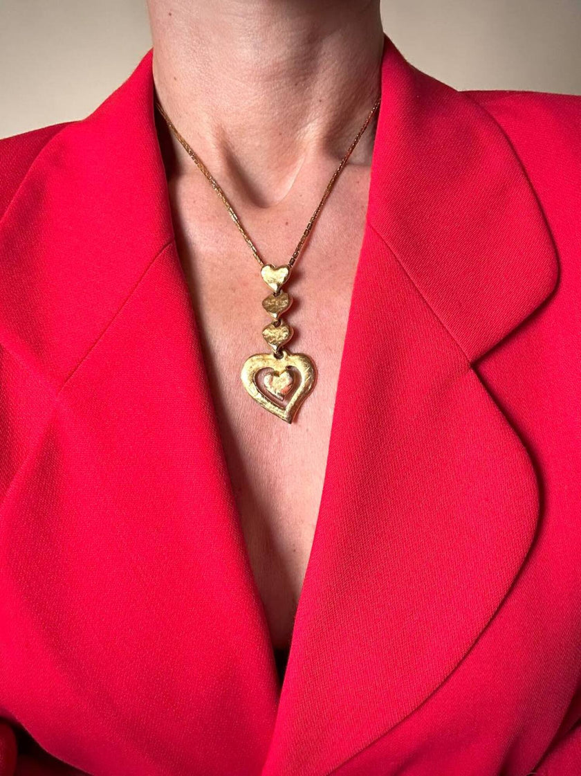 Collana dorata con ciondolo pendente a cuoricini “Yves Saint Laurent”