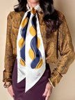 Blusa Yves Saint Laurent in pura seta color topazio con stampa pitone