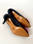 Décolleté vintage Yves Saint Laurent in raso di seta nero con rosa di taffetà fucsia