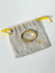 Bracciale vintage Fendi in metallo oro rifinito con smaltato grigio e rosso