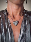 Collier argento con ciondolo a forma di cuore e cristalli incastonati “Yves Saint Laurent”