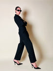 Blazer doppiopetto nero con bottoni dorati “Guaranteed”