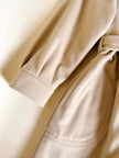 Cappotto lungo a vestaglia con cappuccio in drap di lana beige “Yves Saint Laurent”