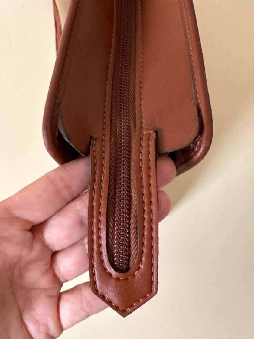 Borsa Yves Saint Laurent in canvas beige con profili color cuoio e motivo greca con logo