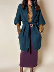 Cardigan Carven in lana verde con manica a tre quarti e cintura in vita