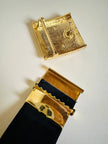 Cintura in camoscio nero con placca logata in metallo oro “Yves Saint Laurent”