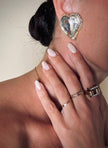 Clip oro con maxi cristalli a forma di cuore “Yves Saint Laurent”