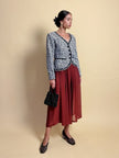 Giacca in cotone piquet bianco con fantasia a fiocchi neri “Yves Saint Laurent”