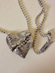 Collier argento con ciondolo a forma di cuore e cristalli incastonati “Yves Saint Laurent”
