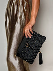 Pochette vintage Rodo in raso nero lavorato a rete con nappa couture e tracolla in catena