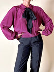Camicia in seta a quadretti fucsia e neri con con fiocco al collo “Valentino”