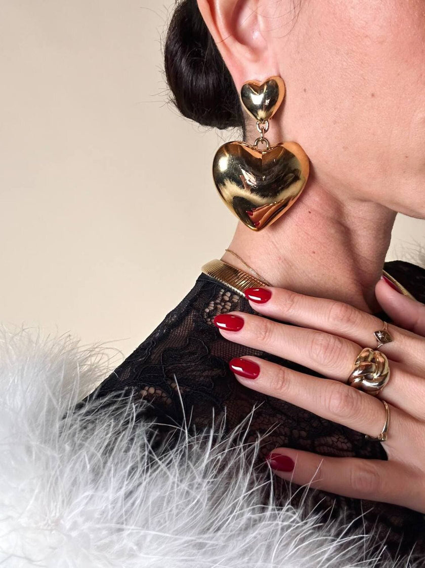 Maxi clip oro con cuori pendenti “Moschino”