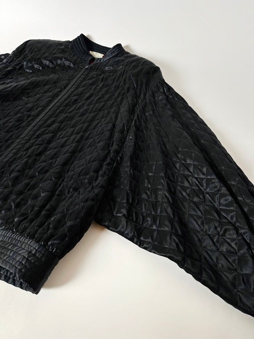 Bomber vintage Valentino Boutique in raso di seta nera trapuntato con fodera rossa