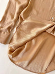 Camicia Yves Saint Laurent in seta jacquard color biscotto con motivo a righe e loghi