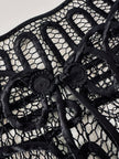 Giacca vintage in seta nera con ricami soutache e alamari