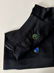 Gonna vintage Yves Saint Laurent Variation in raso nero con bottoni gioiello