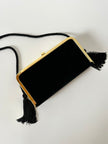 Borsa vintage in velluto nero con struttura dorata e nappe laterali