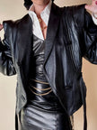 Biker vintage in pelle nera con cintura in vita e fodera couture