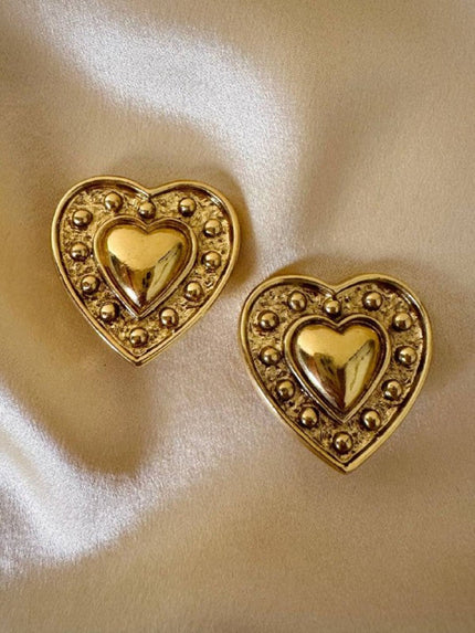 Clip dorate a forma di cuore “Yves Saint Laurent”