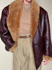 Shearling reverse in pelle liscia marrone castagno con vello caramello e ricamo sul fondo