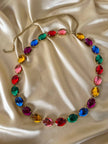 Cintura in catena dorata con strass multicolor