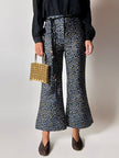 Pantalone a trombetta Merchant Archive in jacquard lamé bluette nero e oro