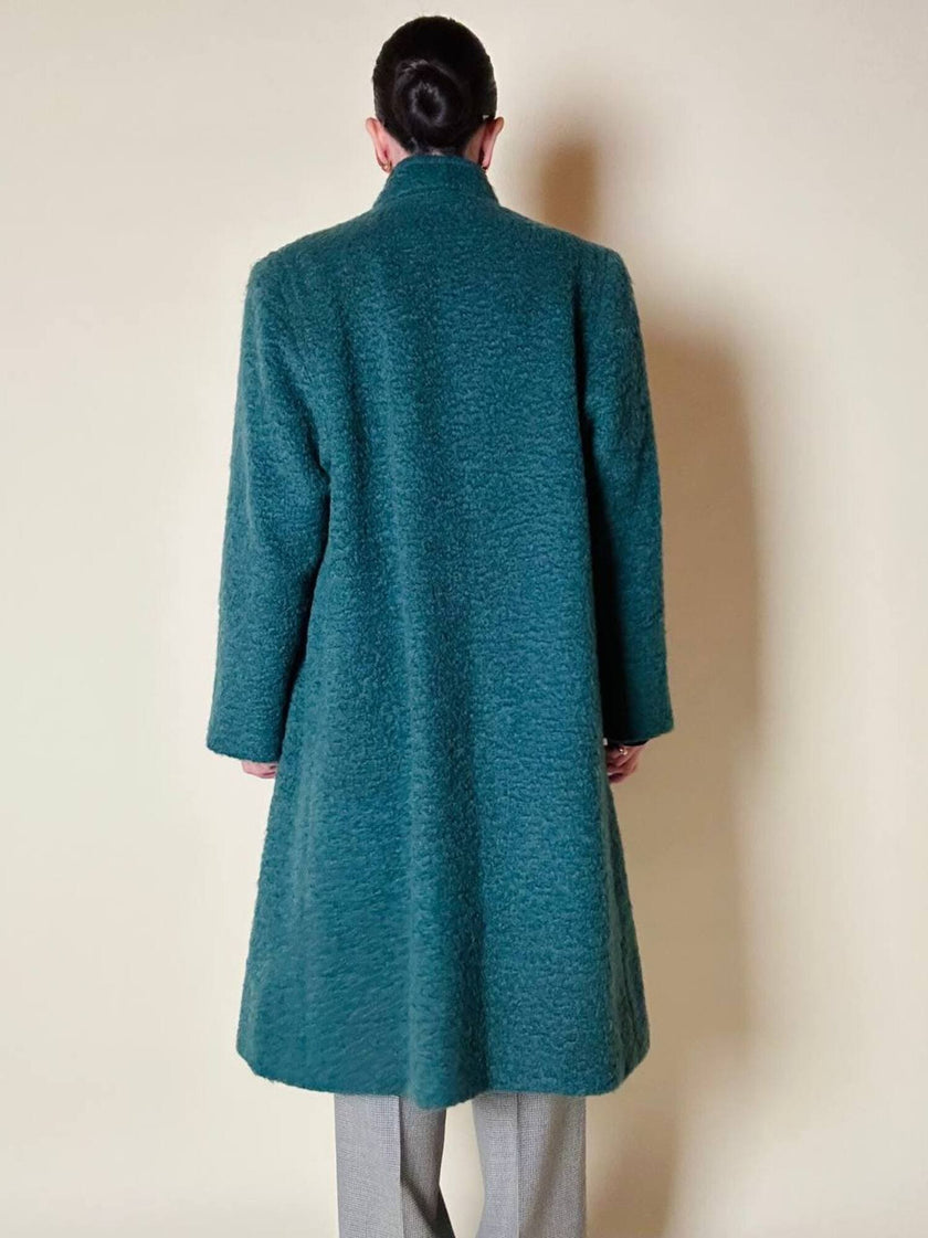 Cappotto doppiopetto in lana bouclé verde bosco con fodera firmata