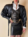 Biker vintage in pelle nera con cintura in vita e fodera couture