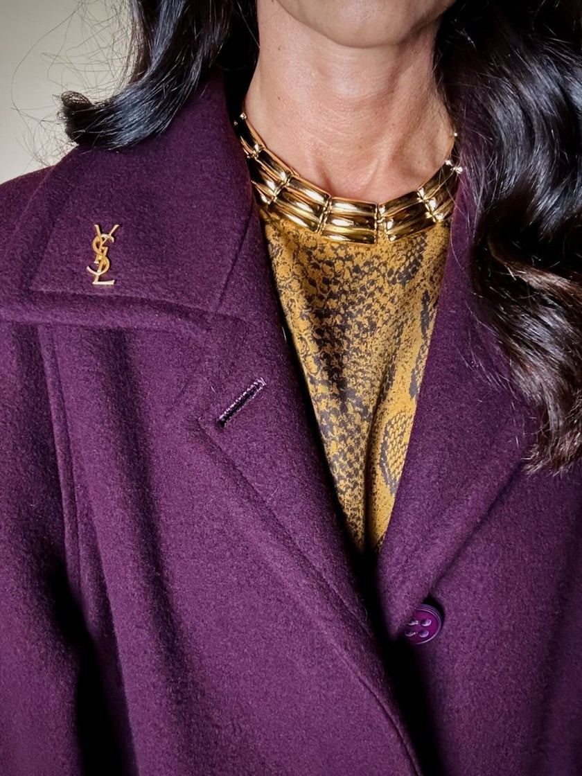 Spilla logo Yves Saint Laurent color oro
