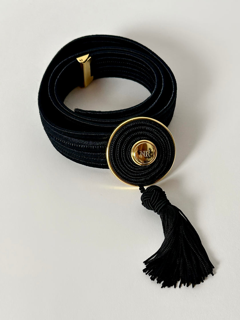 Cintura vintage Nina Ricci Paris in passamaneria elastica nera con fibbia gioiello e nappa couture