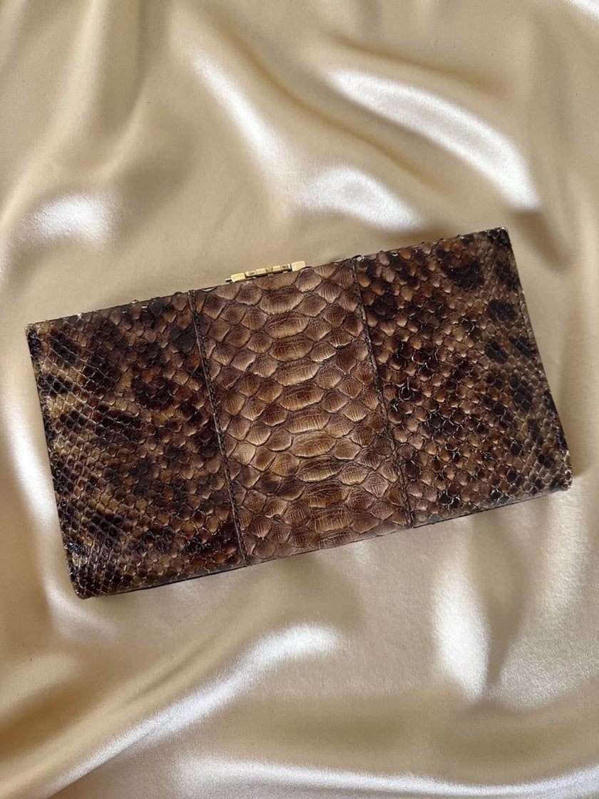 Vintage Roger Vivier leopard-print python clutch with a distinctive rectangular gold-tone metal clasp