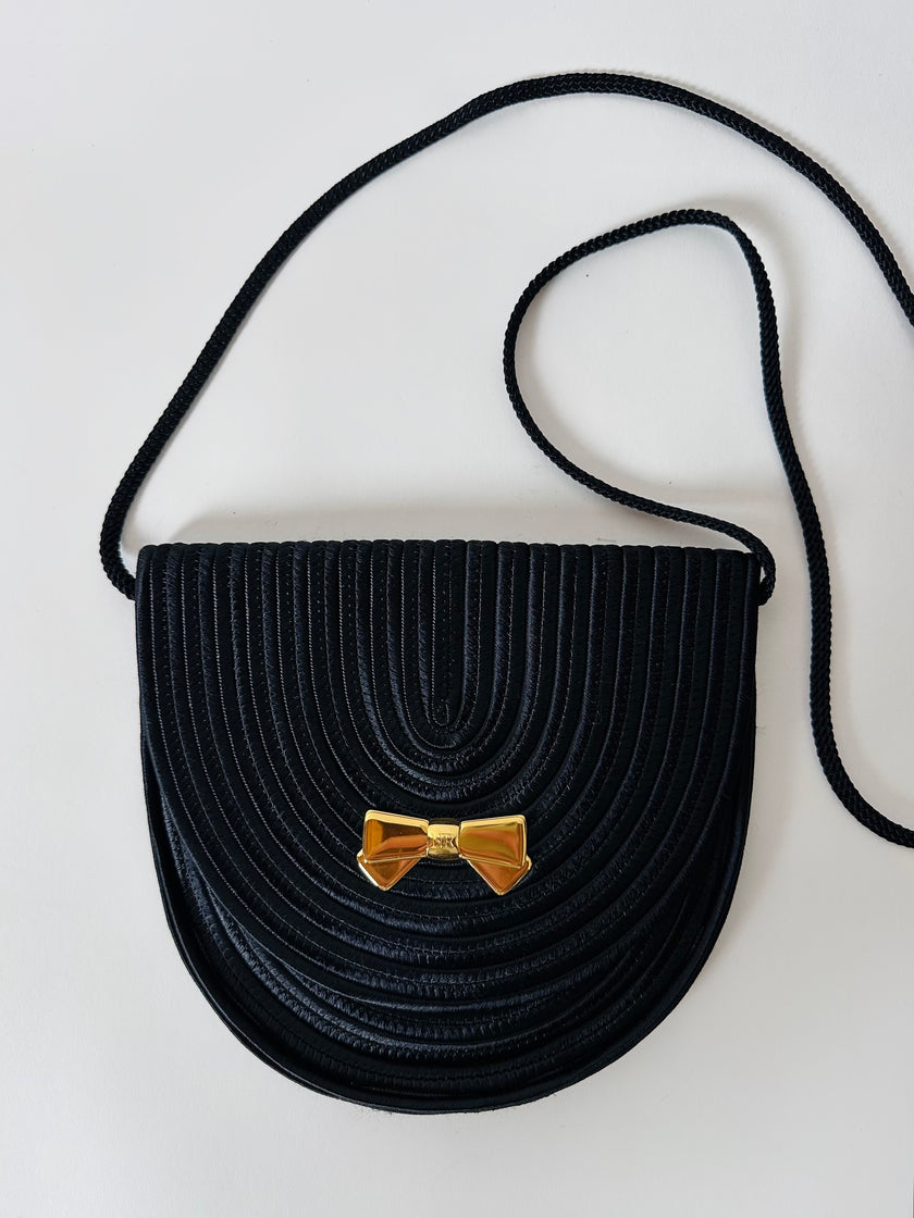 Borsa vintage Nina Ricci Paris in passamaneria nera con fiocco dorato