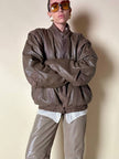 Bomber con maniche rimovibili in pelle color fango “Arpell”