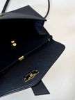 Borsa bandoulière vintage Yves Saint Laurent in tessuto plastificato e pelle blu notte