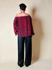 Blusa in seta nera con bocche e cuori rossi “Yves Saint Laurent”