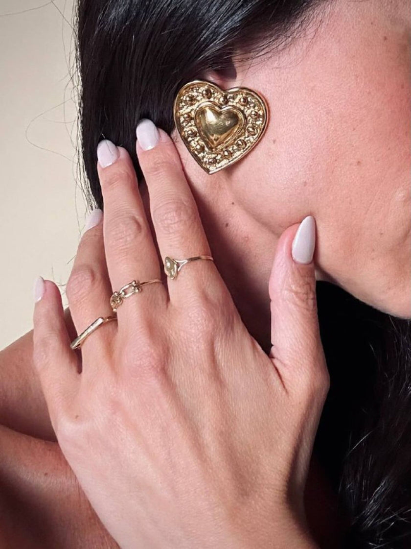 Clip dorate a forma di cuore “Yves Saint Laurent”