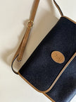 Borsa messenger in pelle nera stampata con profili cuoio “Yves Saint Laurent”