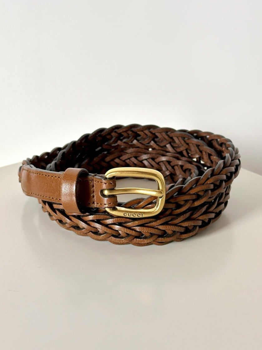 Cintura Gucci in pelle intrecciata color cuoio con fibbia oro
