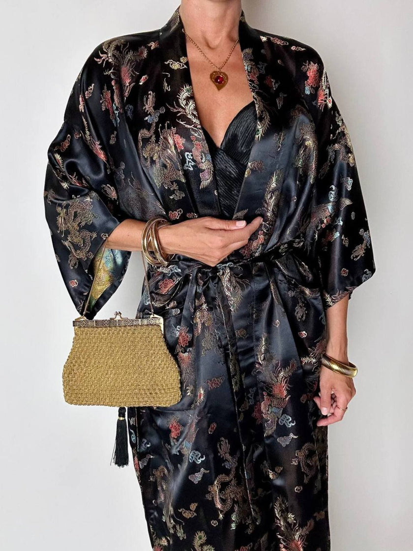Borsa vintage Art Déco in lamé oro intrecciato con chiusura gioiello e nappa couture