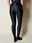 Collant vintage Yves Saint Laurent in lycra lucida nera con elastico logato