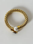 Bracciale vintage in metallo dorato con perla onice nero e cristalli